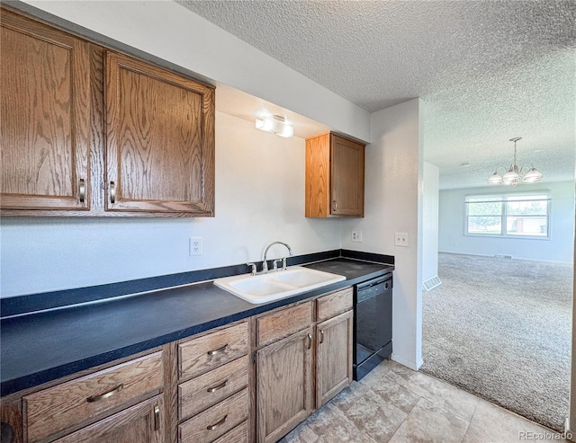 1700 S 6th Ave, Sterling, CO 80751 - kitchen with a sink, black dishwasher, dark countertops, light carpet, and a chandelier