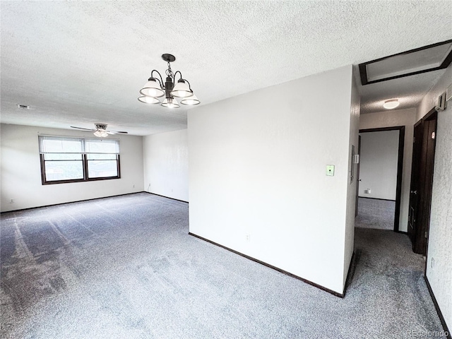 1700 S 6th Ave, Sterling, CO 80751 - carpeted spare room featuring a ceiling fan, a textured ceiling, a chandelier, and baseboards