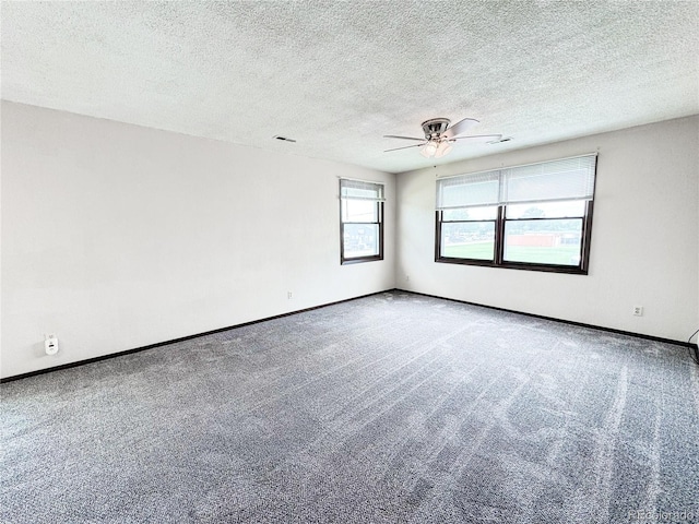 1700 S 6th Ave, Sterling, CO 80751 - carpeted empty room with ceiling fan, baseboards, and a textured ceiling