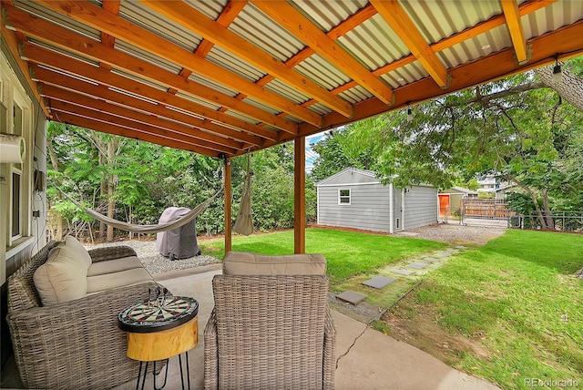 view of patio / terrace featuring a shed