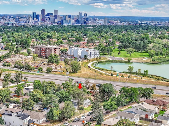 birds eye view of property featuring a water view