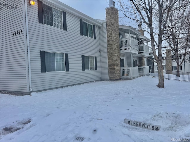 view of snow covered property