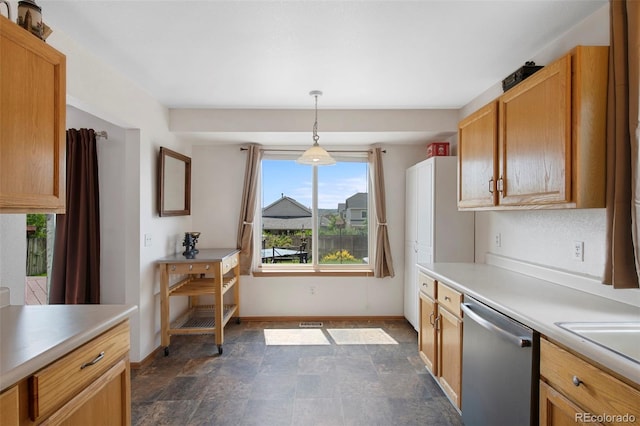 11366 Haswell Dr, Parker, CO 80134 - kitchen with dishwasher, light countertops, stone finish floors, and hanging light fixtures