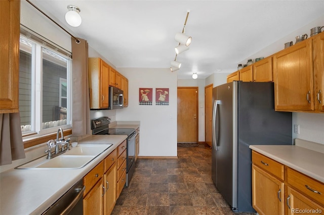 11366 Haswell Dr, Parker, CO 80134 - kitchen with appliances with stainless steel finishes, stone finish flooring, light countertops, and plenty of natural light