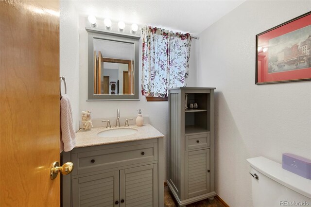 11366 Haswell Dr, Parker, CO 80134 - bathroom with vanity and toilet