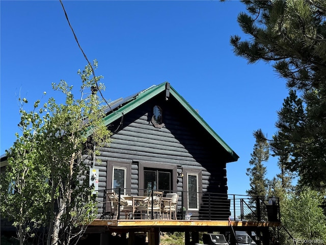253 Bear Ln, Jefferson, CO 80456 - view of home's exterior featuring a deck and log siding
