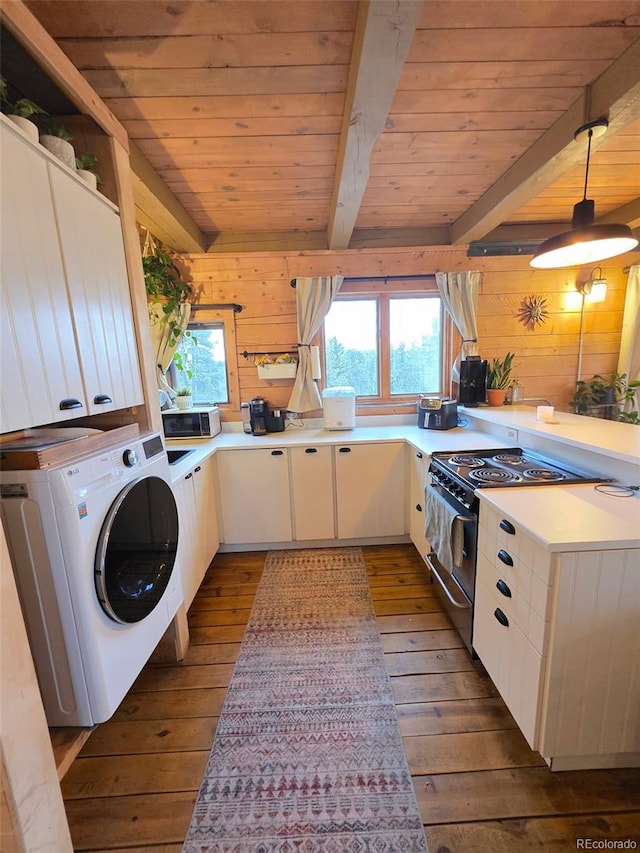 253 Bear Ln, Jefferson, CO 80456 - kitchen featuring washer / clothes dryer, electric range, hardwood / wood-style flooring, wooden walls, and light countertops