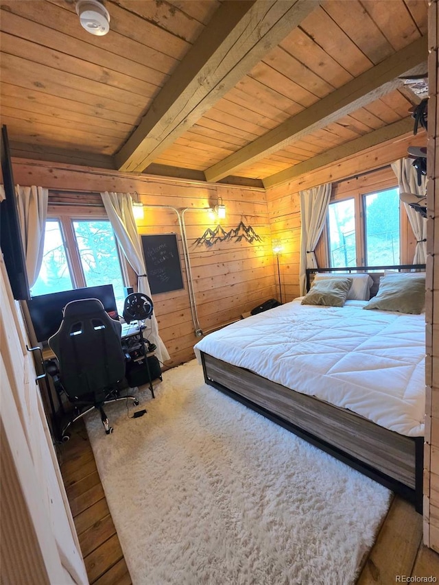 253 Bear Ln, Jefferson, CO 80456 - bedroom featuring a wood ceiling with exposed beams and wood walls