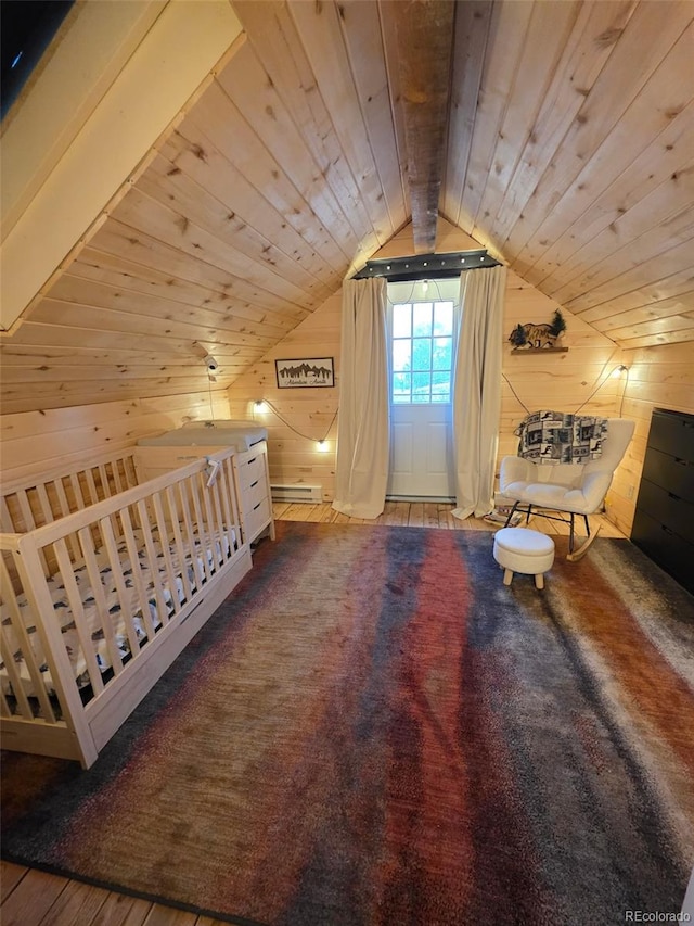 253 Bear Ln, Jefferson, CO 80456 - bedroom with wood walls, wooden ceiling, lofted ceiling, wood finished floors, and baseboard heating