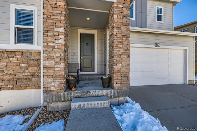 entrance to property with a garage