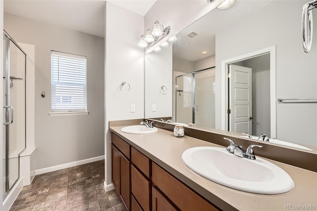 bathroom with vanity and walk in shower