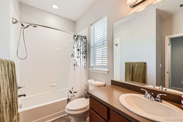 full bathroom featuring vanity, toilet, and shower / bath combo with shower curtain