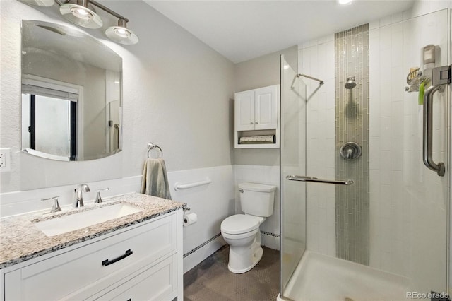 2140 S Youngfield St, Lakewood, CO 80228 - full bath featuring vanity, toilet, and a stall shower