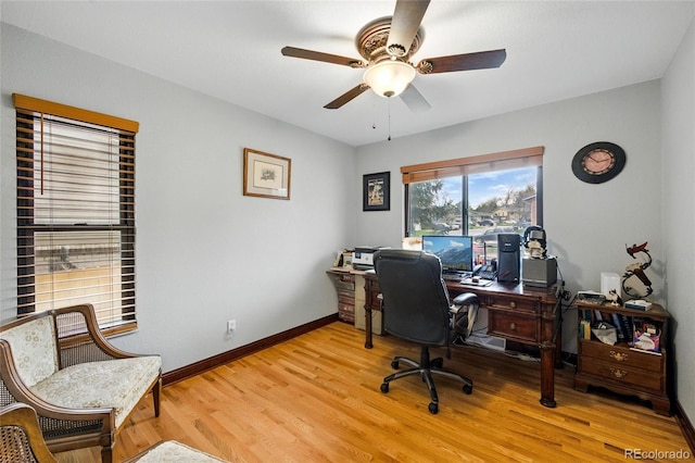 2140 S Youngfield St, Lakewood, CO 80228 - office area featuring baseboards, ceiling fan, and light wood-style flooring