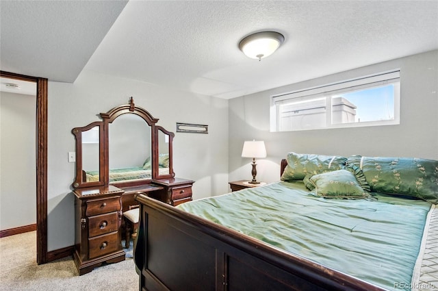 2140 S Youngfield St, Lakewood, CO 80228 - bedroom with baseboards, a textured ceiling, and light carpet