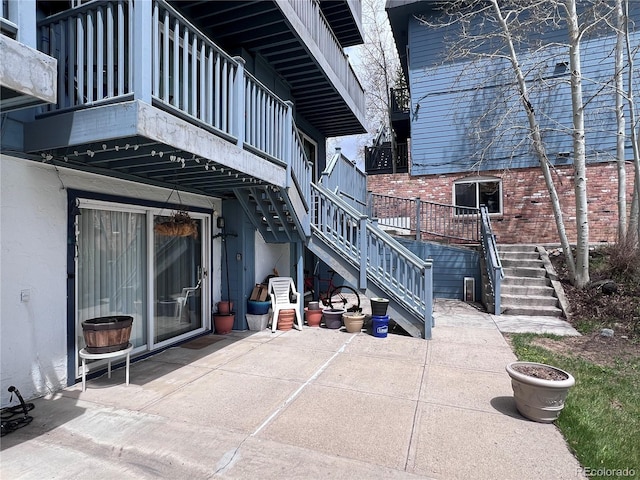330 E Ln Bonte St Unit 2, Dillon, CO 80435 - view of patio featuring stairs and a balcony
