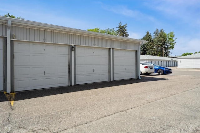 710 S Clinton St Unit 1A, Denver, CO 80247 - view of garage