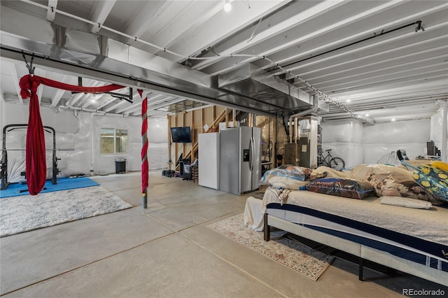 8132 Mt Harvard Rd, Littleton, CO 80125 - below grade area with stainless steel refrigerator with ice dispenser