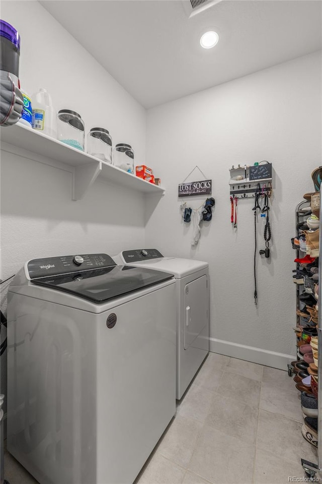 8132 Mt Harvard Rd, Littleton, CO 80125 - laundry area with washer and dryer and recessed lighting