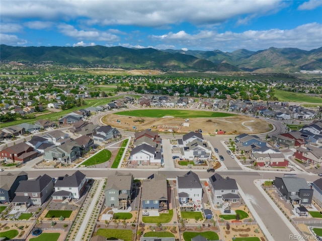 8132 Mt Harvard Rd, Littleton, CO 80125 - aerial view of residential area featuring a mountainous background