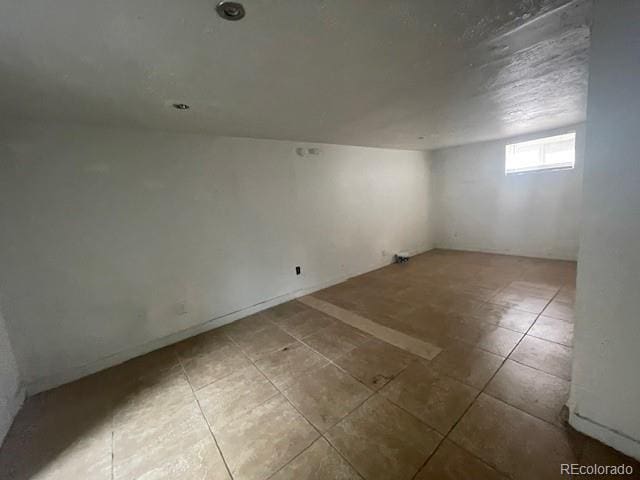 2771 W 1st Ave, Denver, CO 80219 - basement with tile patterned floors