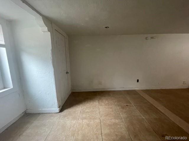 2771 W 1st Ave, Denver, CO 80219 - empty room featuring baseboards