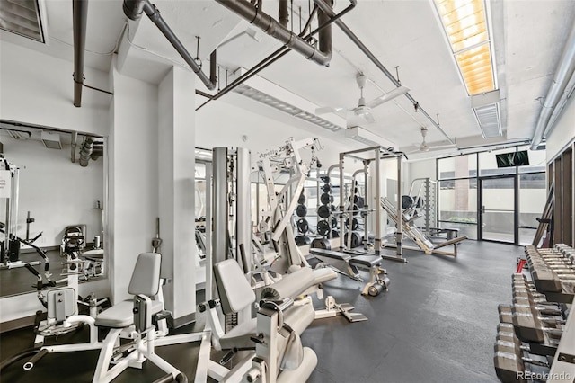 exercise room with ceiling fan