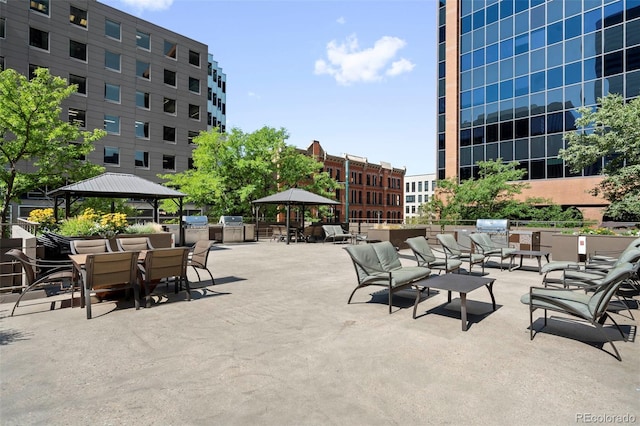 view of patio featuring a gazebo and area for grilling