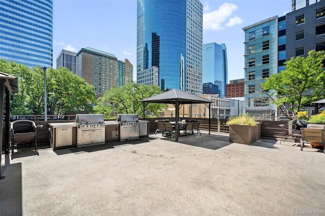 view of patio featuring a gazebo and grilling area