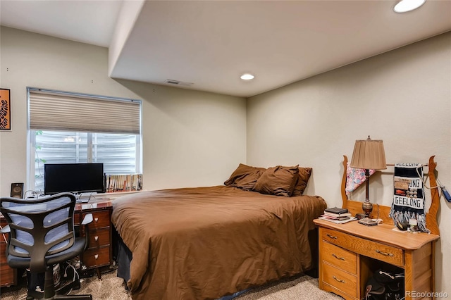 bedroom with recessed lighting, visible vents, and light colored carpet