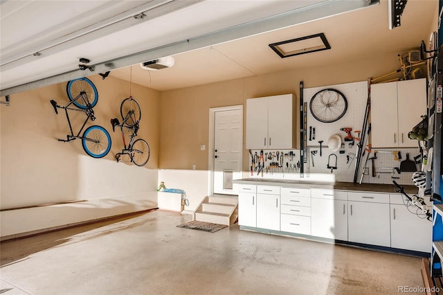 garage featuring a garage door opener