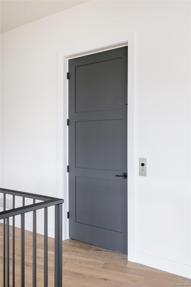 hallway featuring light hardwood / wood-style flooring