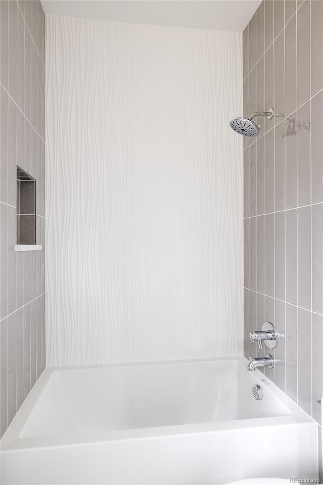 bathroom featuring shower / bathtub combination with curtain