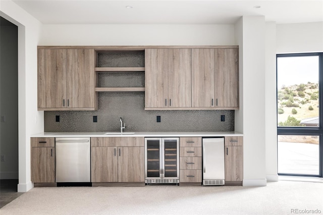 kitchen with sink, dishwasher, wine cooler, and decorative backsplash