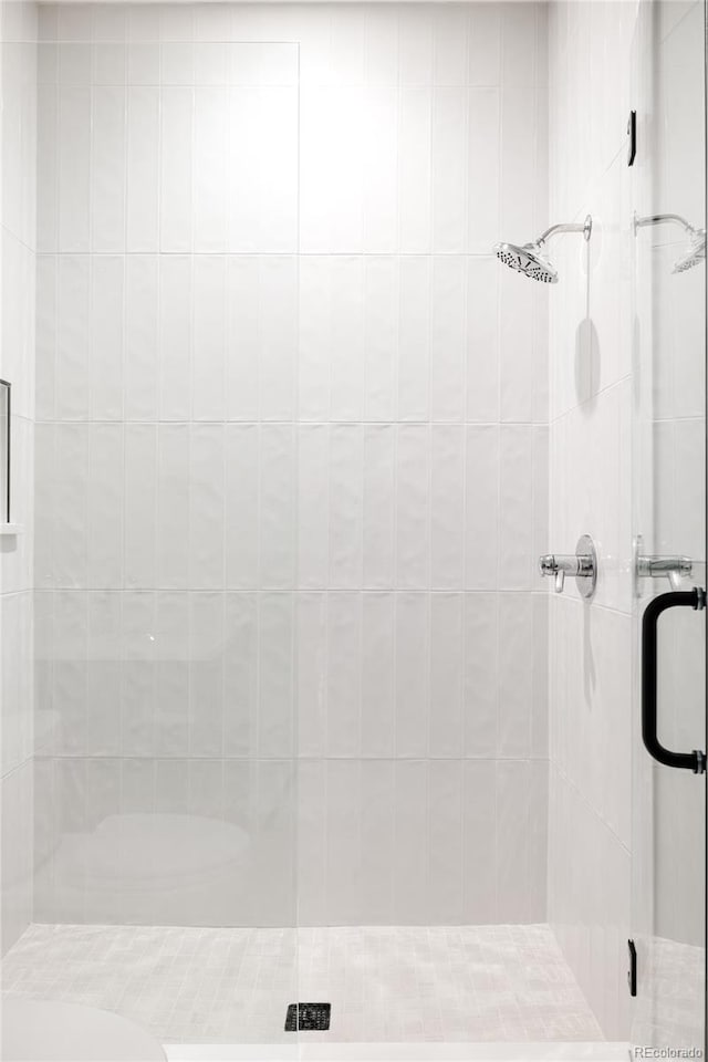 bathroom with an enclosed shower