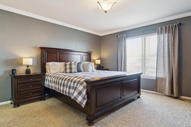 bedroom with light colored carpet, ornamental molding, and baseboards