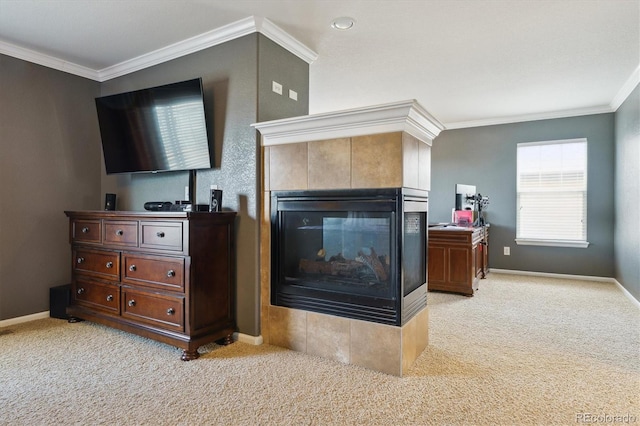 bedroom with light colored carpet, a tile fireplace, crown molding, and baseboards