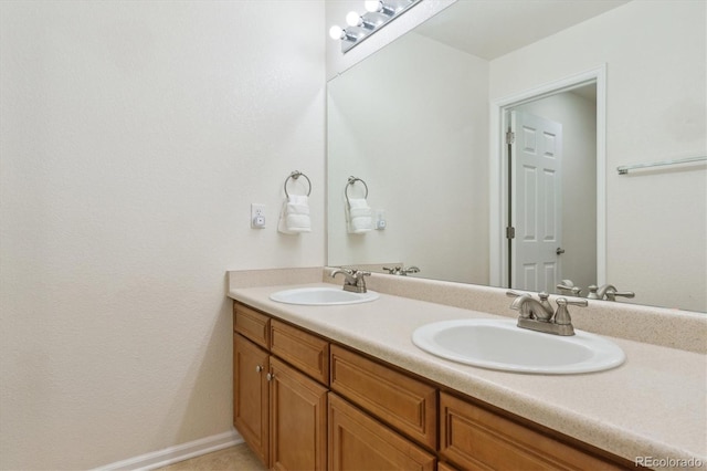 bathroom featuring double vanity