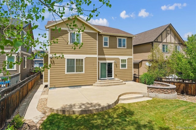 rear view of house with a patio area