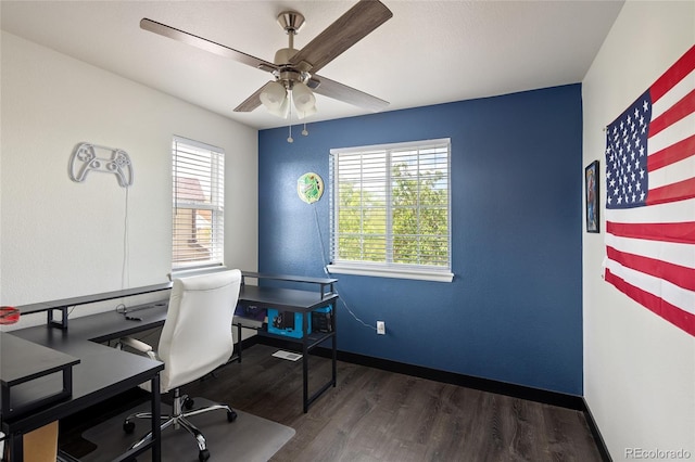 office featuring ceiling fan, plenty of natural light, wood finished floors, and baseboards