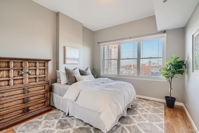 bedroom featuring light wood-type flooring