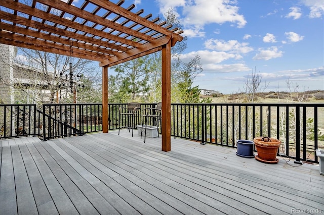 wooden terrace with a pergola