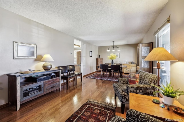 1479 S Jasper St, Aurora, CO 80017 - living area featuring wood finished floors and a textured ceiling