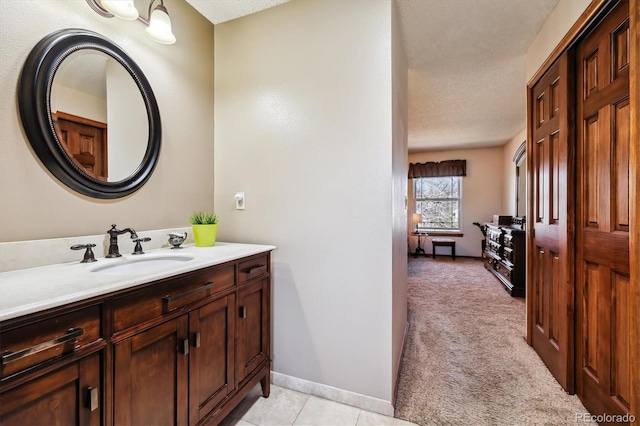 1479 S Jasper St, Aurora, CO 80017 - bathroom with vanity and baseboards