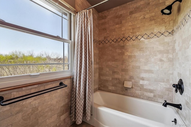 1479 S Jasper St, Aurora, CO 80017 - bathroom featuring shower / bath combination with curtain