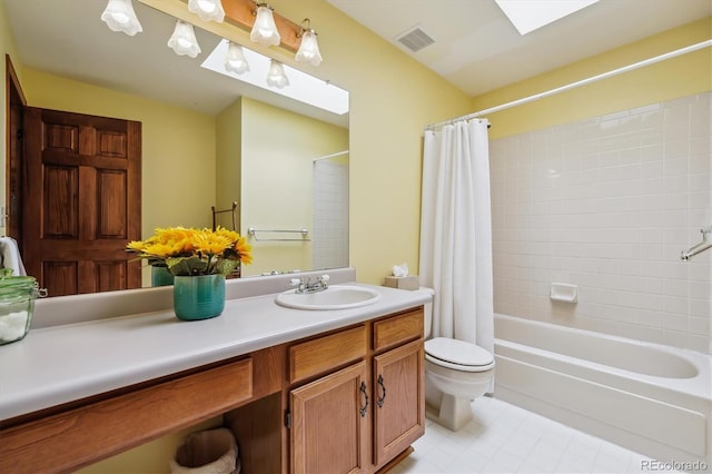 1479 S Jasper St, Aurora, CO 80017 - full bath with toilet, vanity, shower / bath combo with shower curtain, and tile patterned flooring