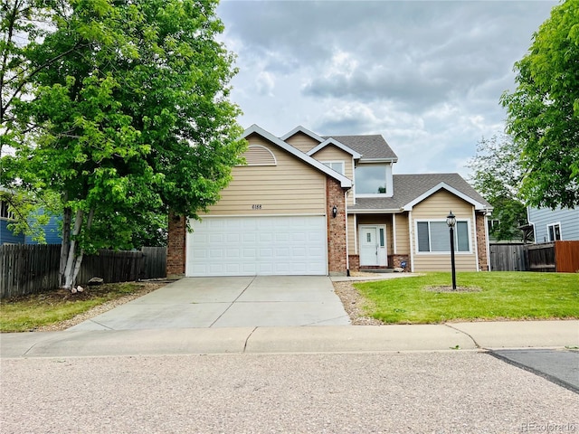 6188 Viewpoint Ave, Firestone, CO 80504 - view of front of property with brick siding, driveway, a garage, and roof with shingles