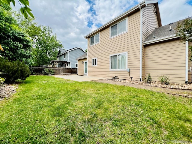 6188 Viewpoint Ave, Firestone, CO 80504 - back of property with a patio area