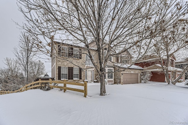 view of front of home with a garage