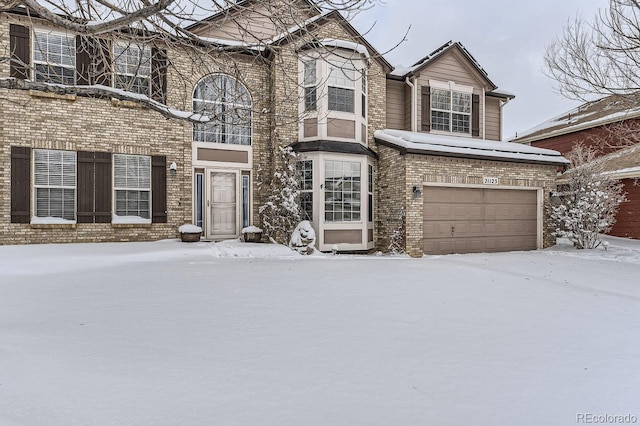 front of property with a garage